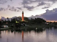 Jupiter Inlet Lighthouse reflected in the water at dusk