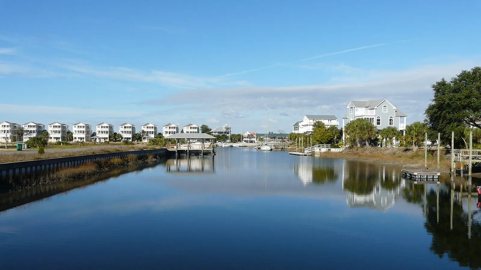 Residential canal lined with seawalls and docks in Florida